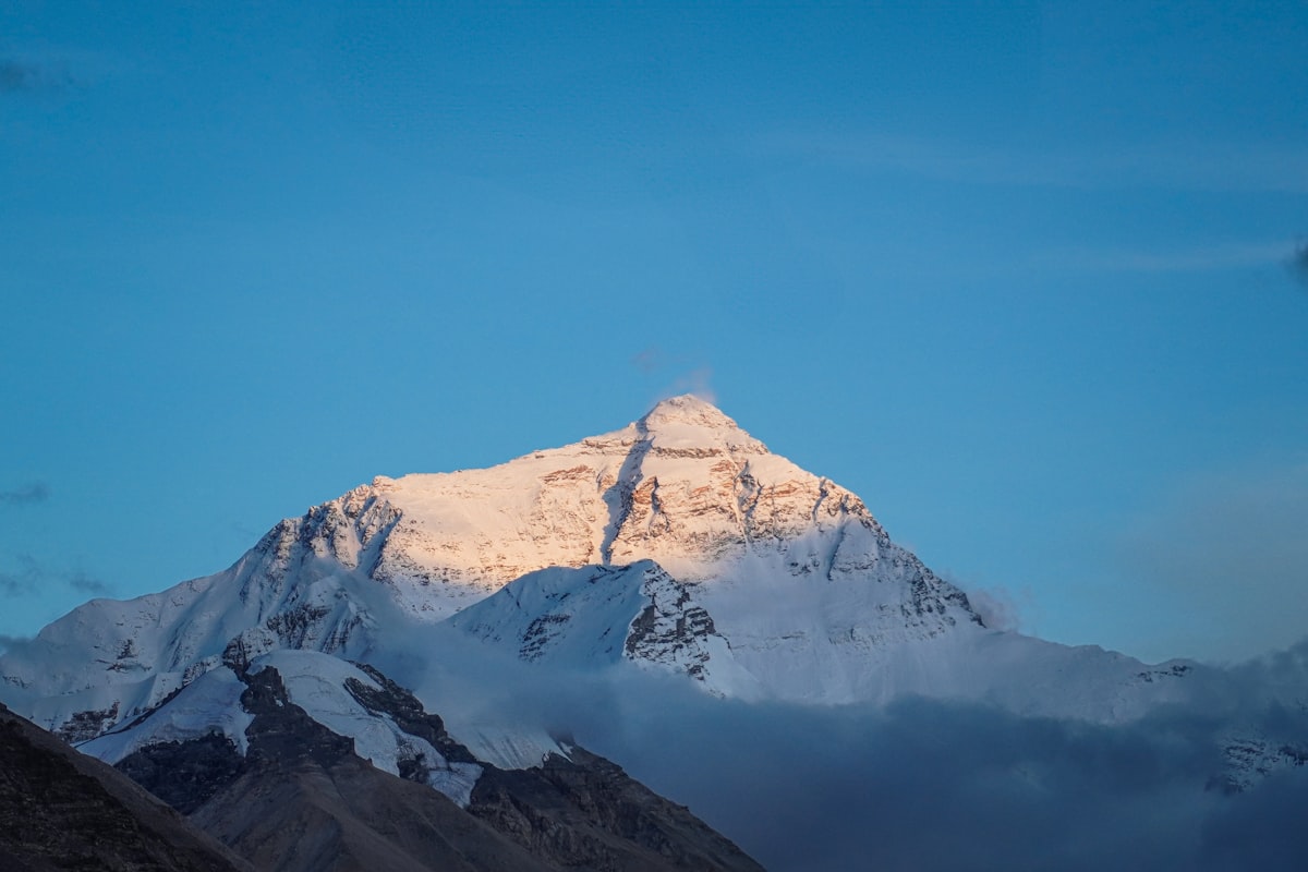 Everest north face at sunset from the Tibetan side — the view from Rongbuk Monastery near Base Camp
