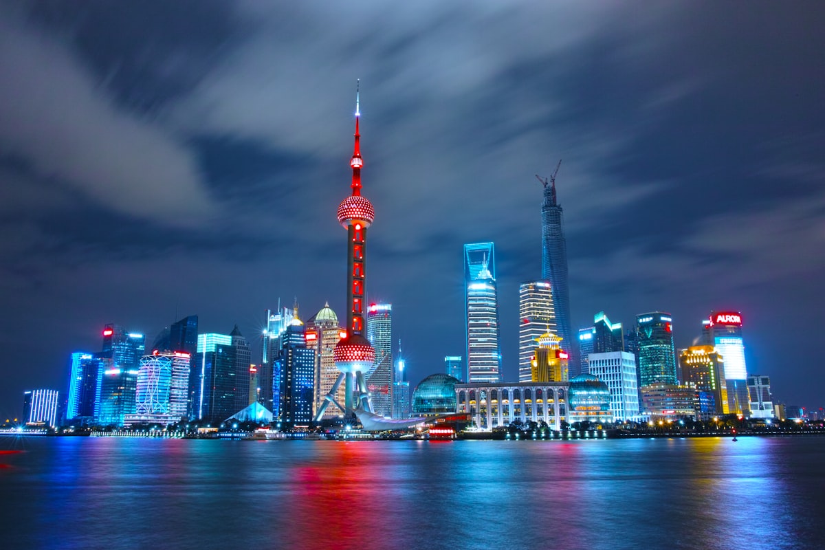 Shanghai Pudong skyline at night with the Bund in the foreground