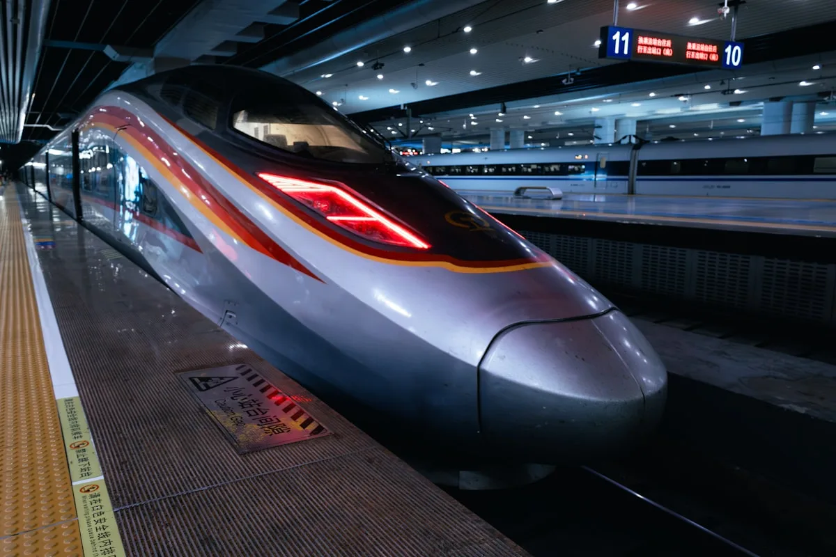 A Fuxing bullet train standing at a Chinese high-speed rail platform