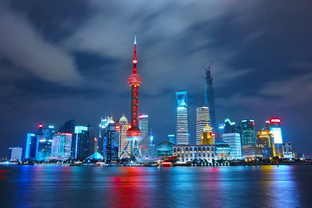 The Lujiazui skyline in Shanghai at night, the Oriental Pearl Tower and surrounding skyscrapers lit up