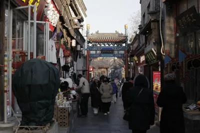 Narrow alley in Beijing old hutong, everyday street life