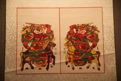 A pair of mounted warrior door gods printed in the Zhuxian Town style, Qin Qiong on the left and Yuchi Gong on the right, displayed at the Kaifeng Museum (Photo: Gary Todd, CC0)
