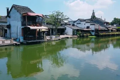 Traditional buildings along a canal in Jiaxing, Zhejiang — classic Jiangnan water town
